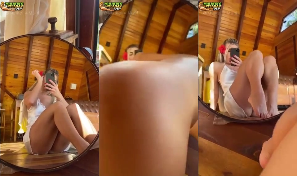 Maikelly Muhl brincando no espelho