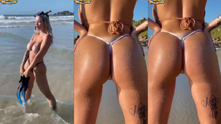 Giovanna Genesini nua na praia...