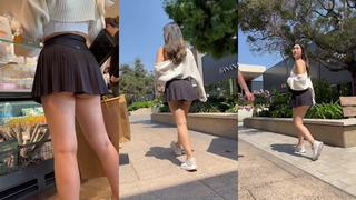 Saia safadinha mostrando a polpinha do rabo